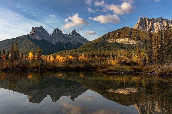 Three Sisters reflect into pool in Canmore-Alberta-Canada